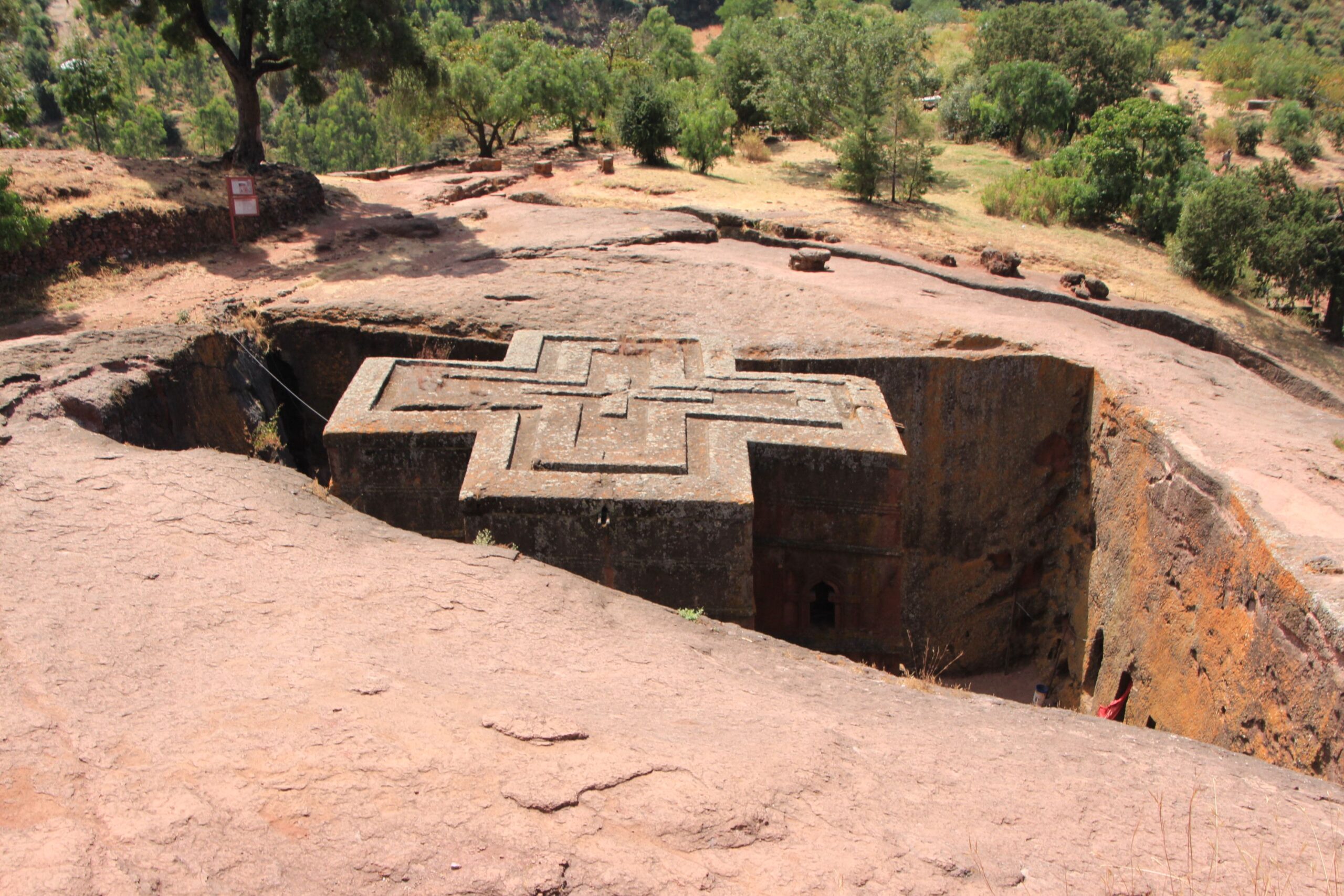 Aerial view of the rock-hewn cross-shaped Church of Saint George in Lalibela, Ethiopia